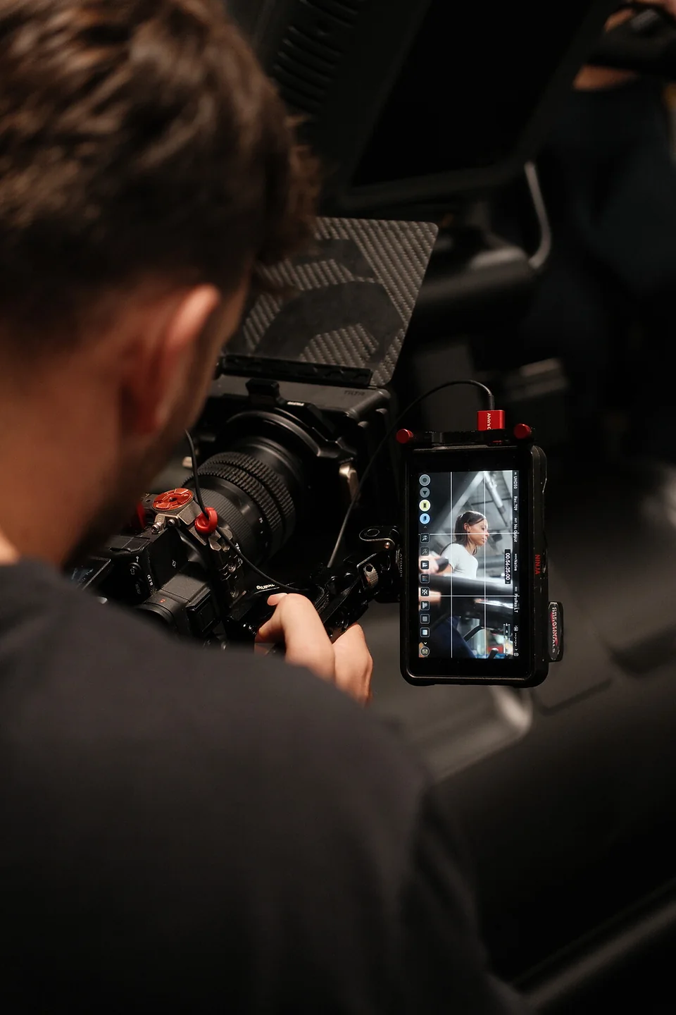 Jake Rainford operating a cinema camera on a brand film shoot