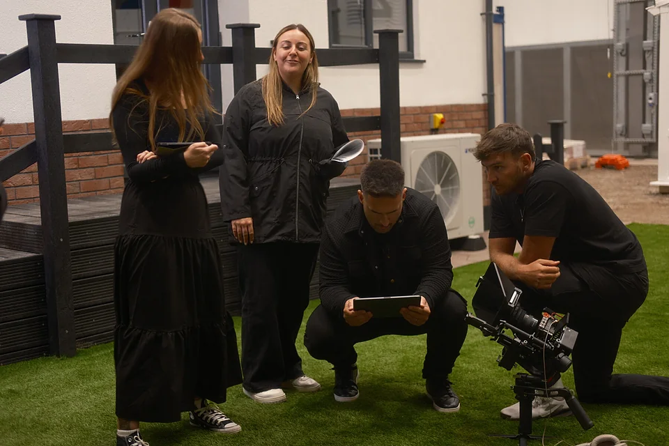 Directing the team on set during a video production